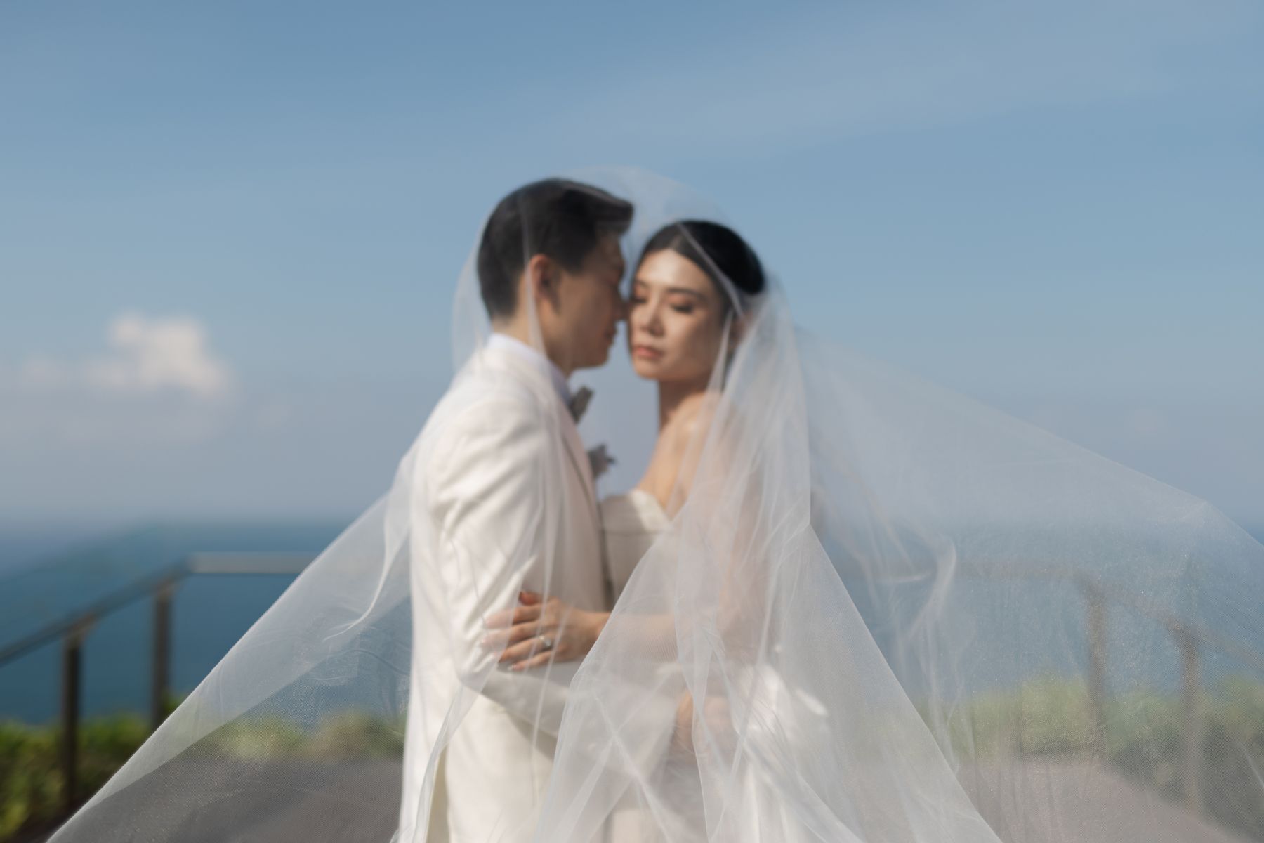 A Mirrored Aisle and a Bali Sky: Nouva &amp; Hary's Wedding at Six Senses Uluwatu photo