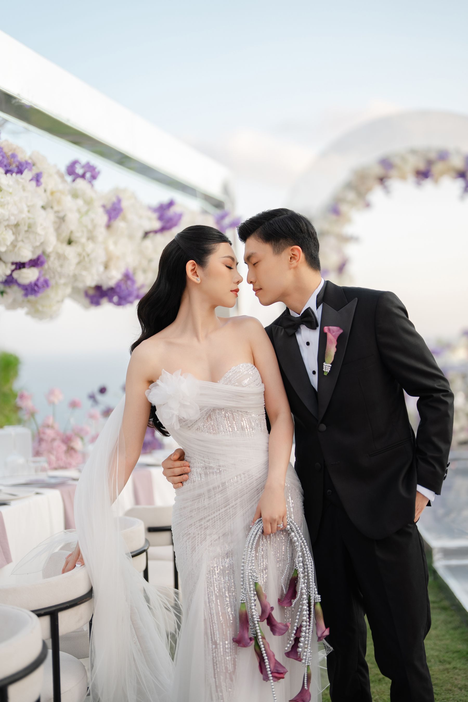 A Mirrored Aisle and a Bali Sky: Nouva &amp; Hary's Wedding at Six Senses Uluwatu photo