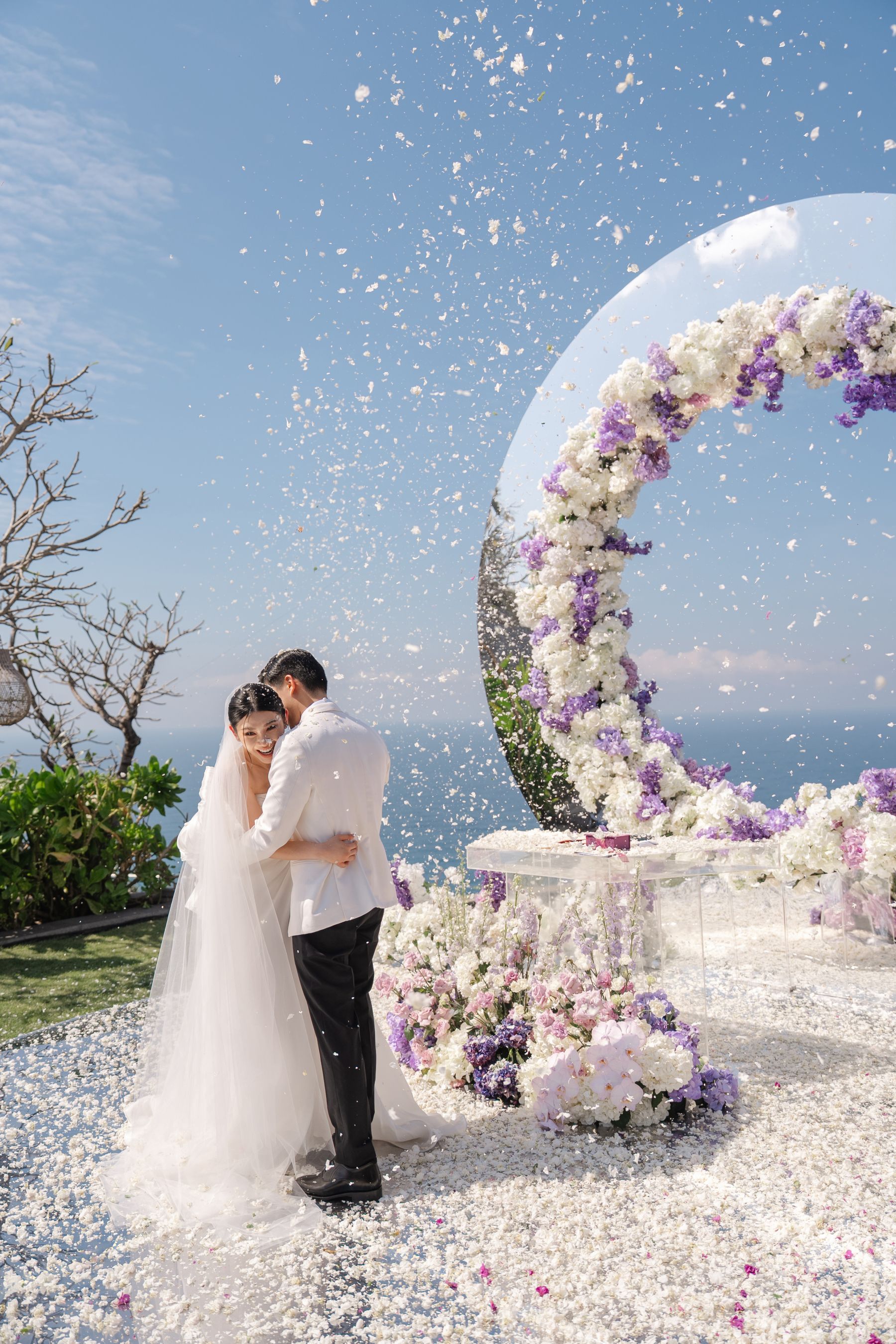 A Mirrored Aisle and a Bali Sky: Nouva &amp; Hary's Wedding at Six Senses Uluwatu photo