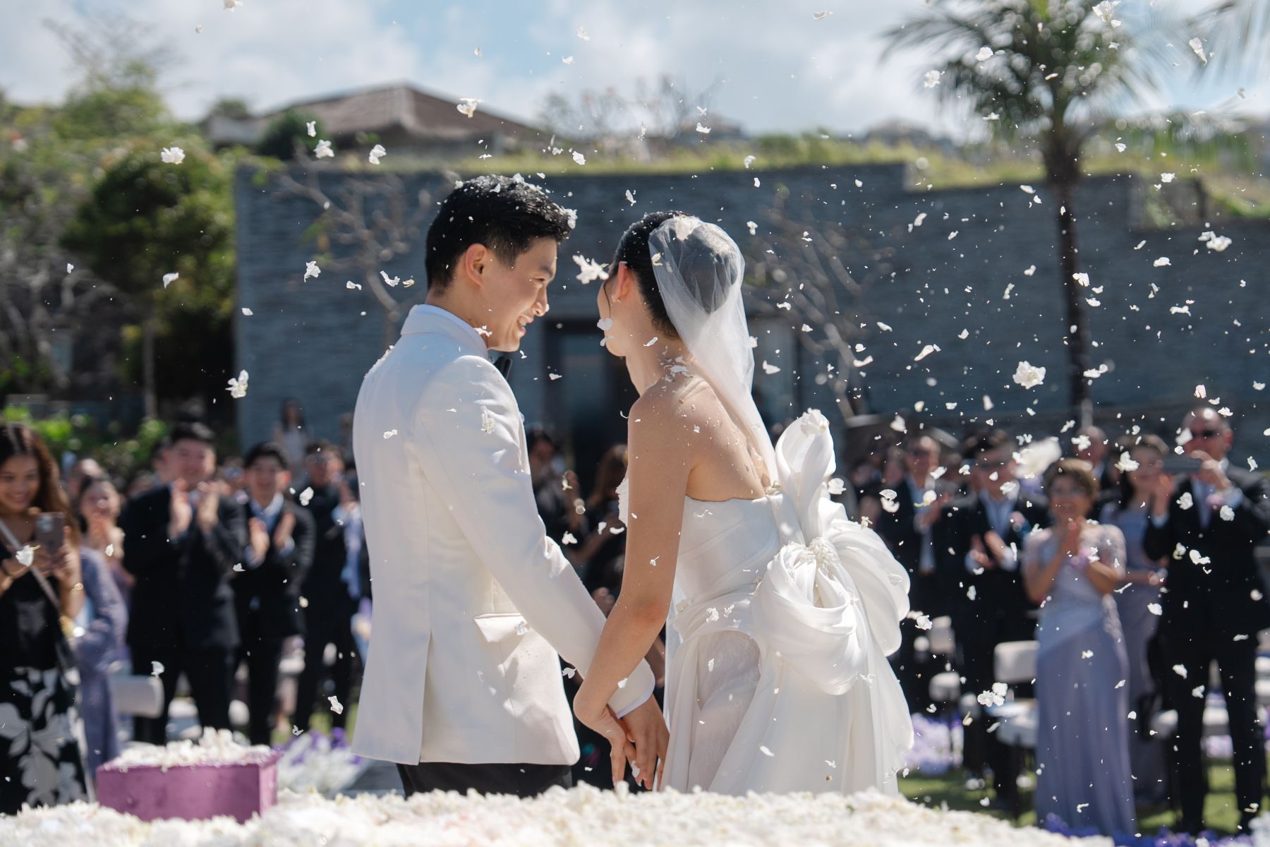 A Mirrored Aisle and a Bali Sky: Nouva &amp; Hary's Wedding at Six Senses Uluwatu photo