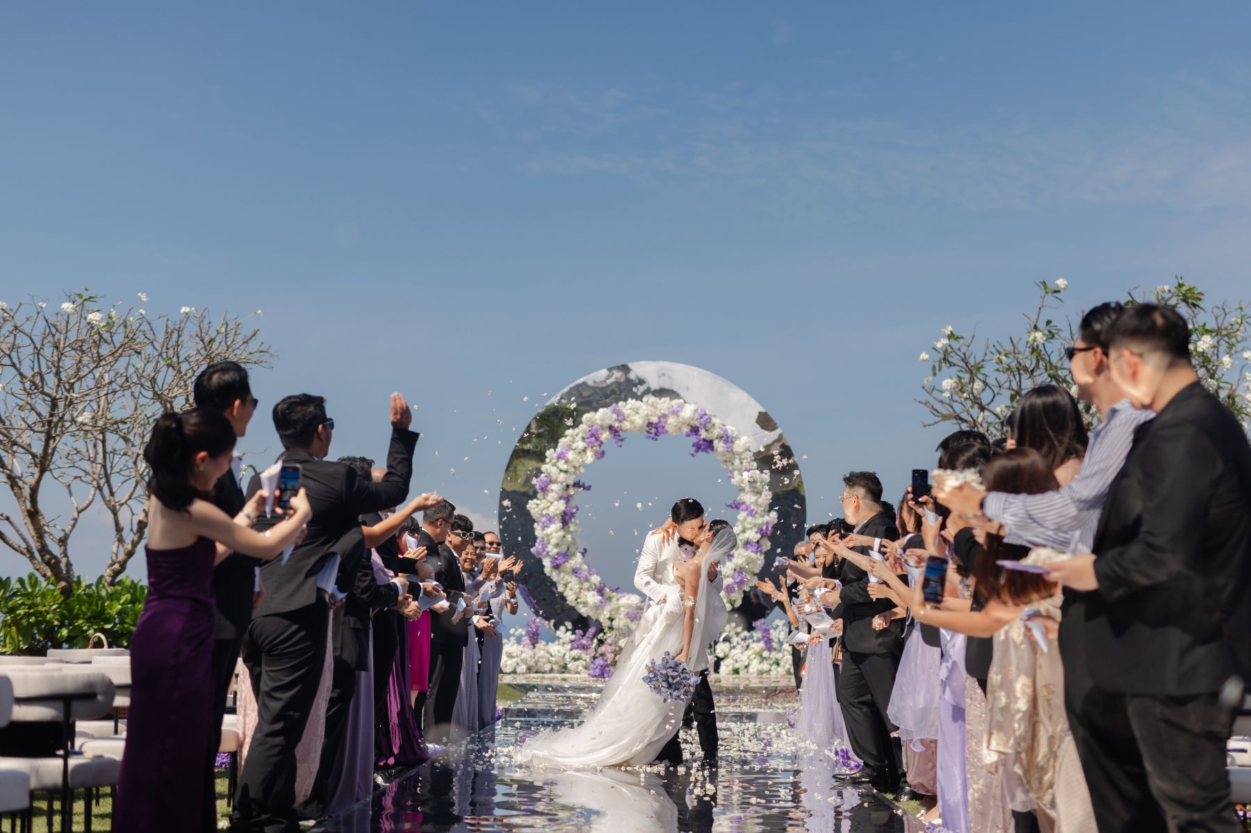 A Mirrored Aisle and a Bali Sky: Nouva &amp; Hary's Wedding at Six Senses Uluwatu photo