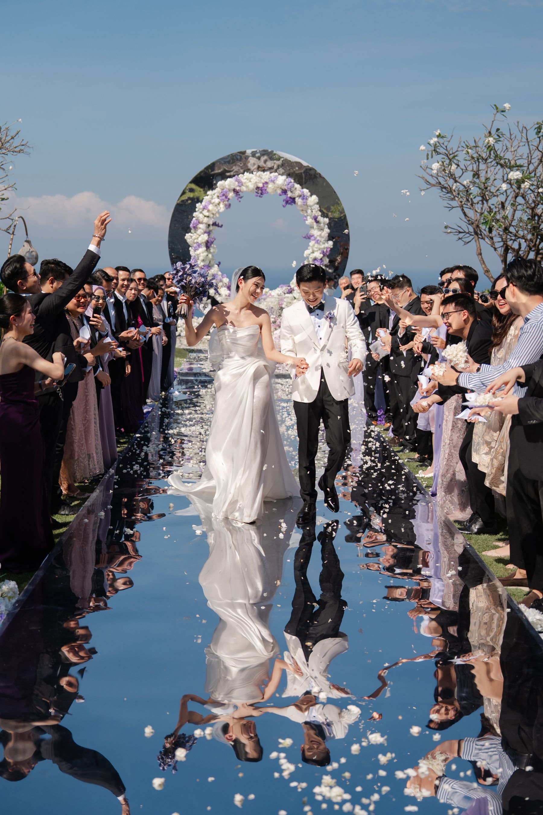 A Mirrored Aisle and a Bali Sky: Nouva &amp; Hary's Wedding at Six Senses Uluwatu photo