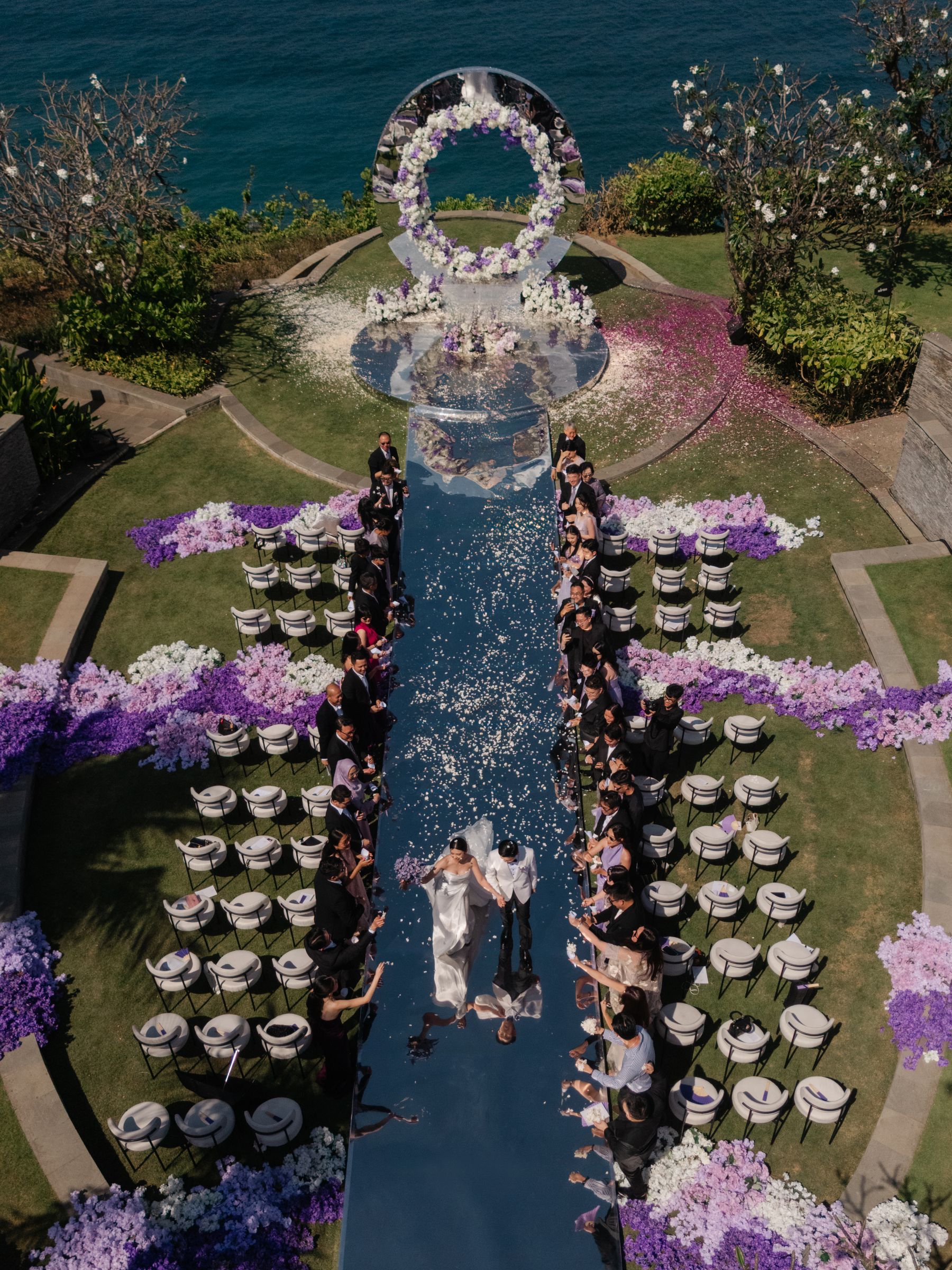 A Mirrored Aisle and a Bali Sky: Nouva &amp; Hary's Wedding at Six Senses Uluwatu photo